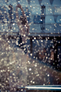 Reflection of woman in water