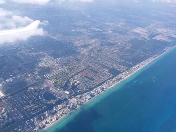 Aerial view of cityscape and sea