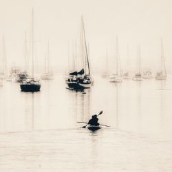 Boats sailing in sea