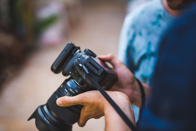 Midsection of man photographing