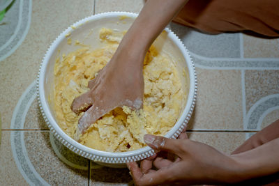 Midsection of woman preparing food