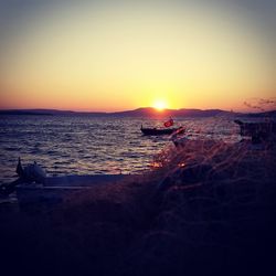 Scenic view of sea at sunset