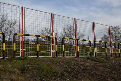 View of wire fence against sky