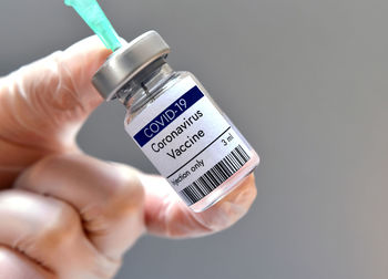 Coronavirus vaccine in vial. research in laboratory against covid-19.