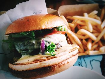 Close-up of hamburger with french fries