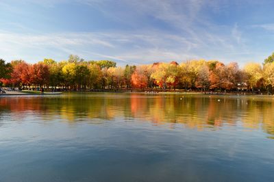 Scenic view of lake against sky during autumn