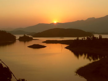 Scenic view of mountains at sunset