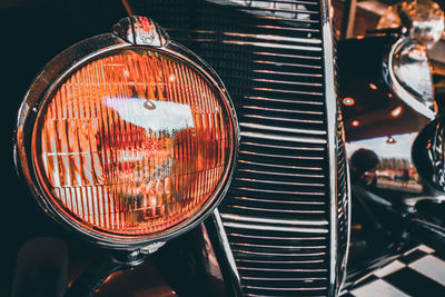 Vintage and classy bumper and car headlight at maeklong railway market in bangkok city