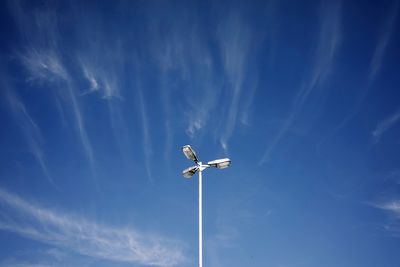 Low angle view of wind turbine against sky