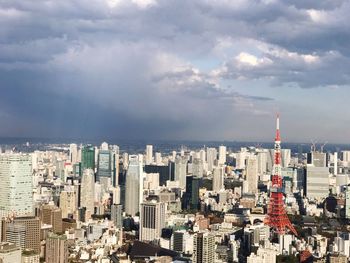 High angle view of buildings in city against sky