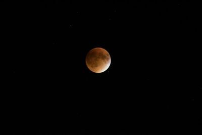 Low angle view of moon in sky