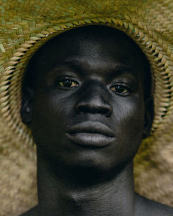 Close-up of man wearing hat