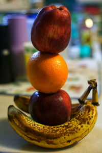 Close-up of fruits in plate on table