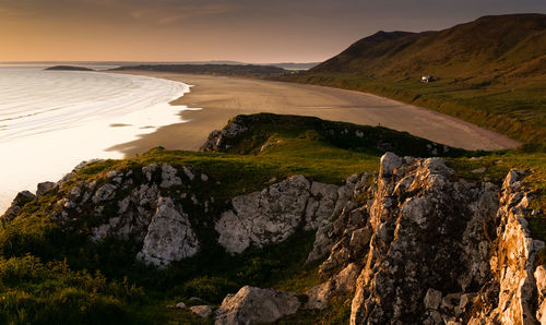 Scenic view of landscape against sky during sunset