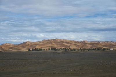 Scenic view of desert against sky