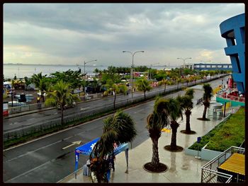 Road in city against sky