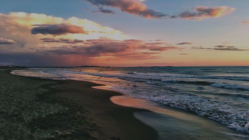 Scenic view of beach during sunset