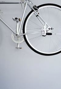 High angle view of bicycle wheel against wall