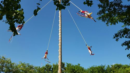 Low angle view of kite flying in sky