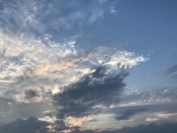 Low angle view of clouds in sky during sunset