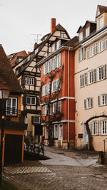 Houses against sky in city