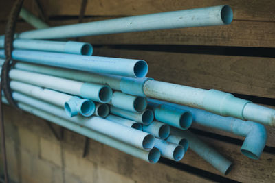 Close-up of pipes against wall
