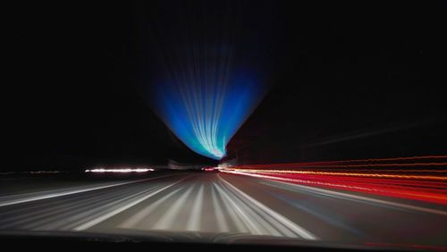 Light trails on road at night