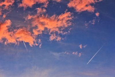 Low angle view of cloudy sky at sunset