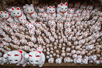 High angle view of figurine for sale at market stall