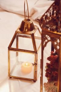 Close-up of illuminated lighting equipment on table