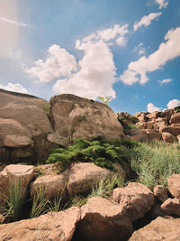 Rock formations on landscape against sky