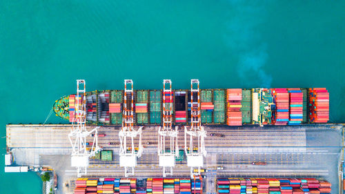 High angle view of container ship at commercial dock