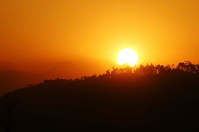 Scenic view of landscape at sunset