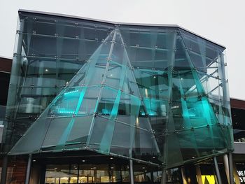 Low angle view of modern building against sky