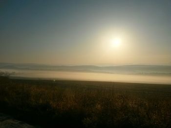 Scenic view of sea against clear sky during sunset