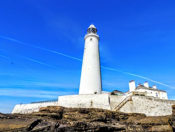 Low angle view of lighthouse against sky