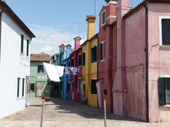 Alley amidst buildings in town