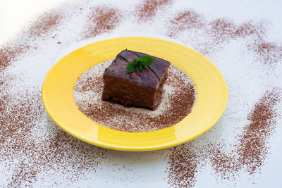 High angle view of cake in plate on table