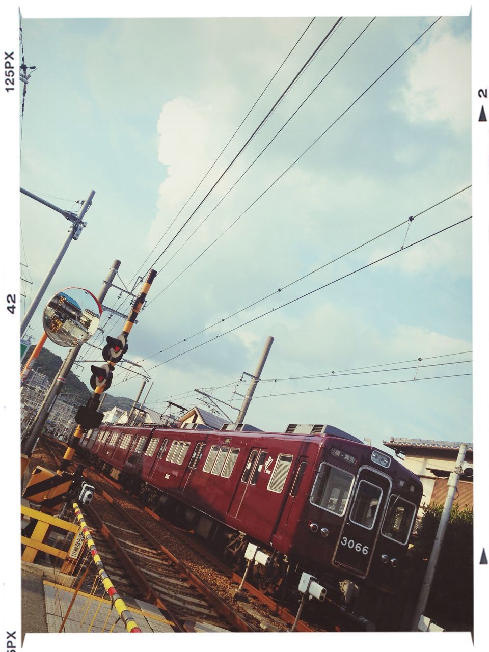 sky, low angle view, architecture, built structure, building exterior, cloud - sky, transfer print, auto post production filter, cloudy, city, power line, cloud, cable, day, outdoors, construction site, connection, no people, building, crane - construction machinery