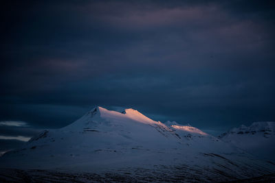 Mountain ridge at sunset with dramatic light in iceland