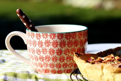 Close-up of coffee cup on table