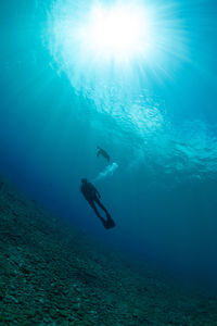 Person swimming in sea