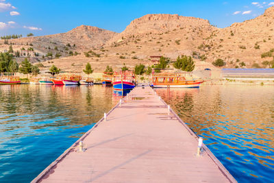 Scenic view of lake against blue sky