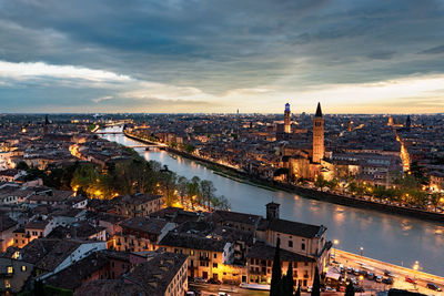 High angle view of river amidst buildings in city