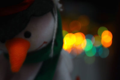 Close-up of illuminated christmas lights at night