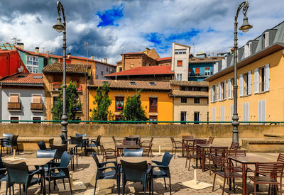 Empty chairs and tables in restaurant