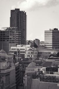 Modern cityscape against sky