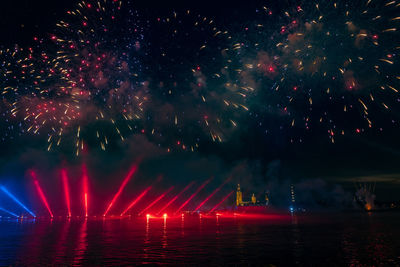 Firework display at night