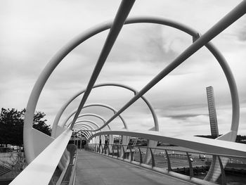 Close-up of pedestrian bridge architecture against sky