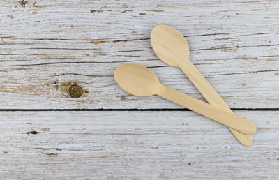 Directly above shot of wooden spoons on table